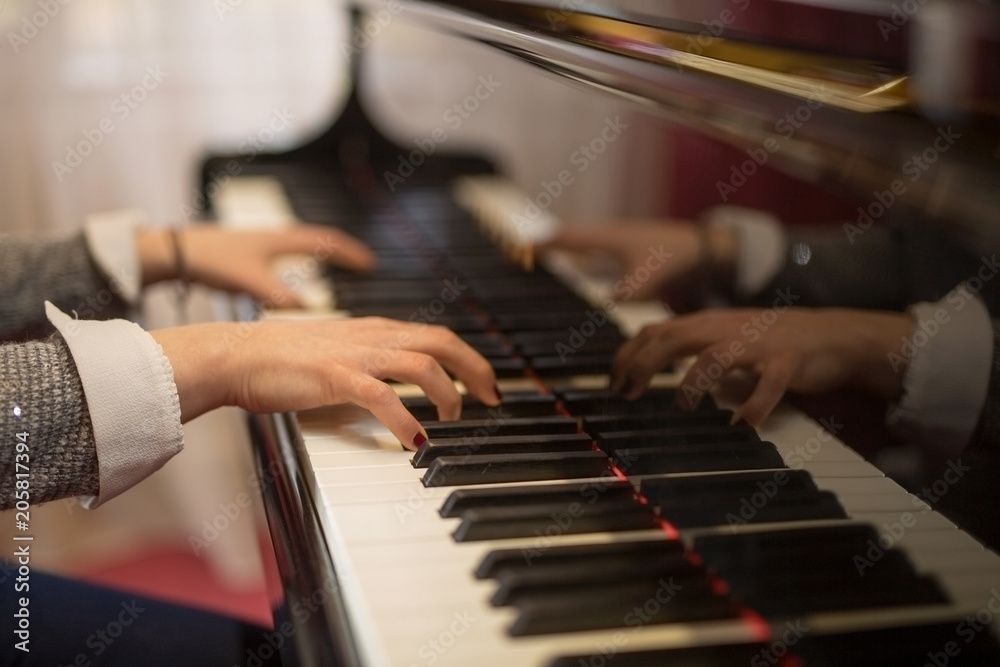 Obraz premium Playing a piano