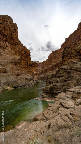 Colorado River runs through Grand Canyon providing exciting whitewater rafting and incredible views along the way. Numerous side canyons can be hiked, often to beautiful waterfalls.