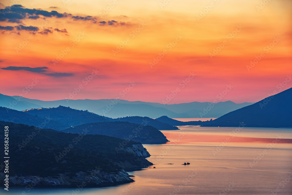 Colorful sunset over sea in Greece
