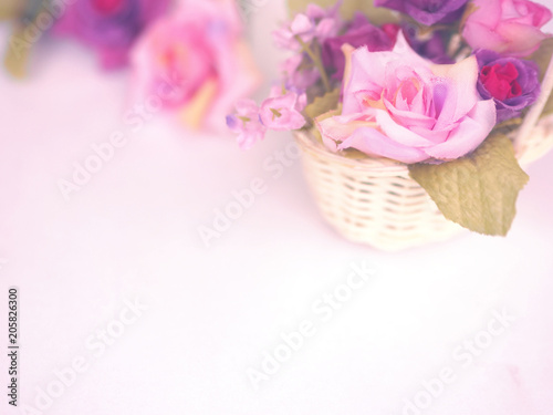  rose bouquet in small basket on white background