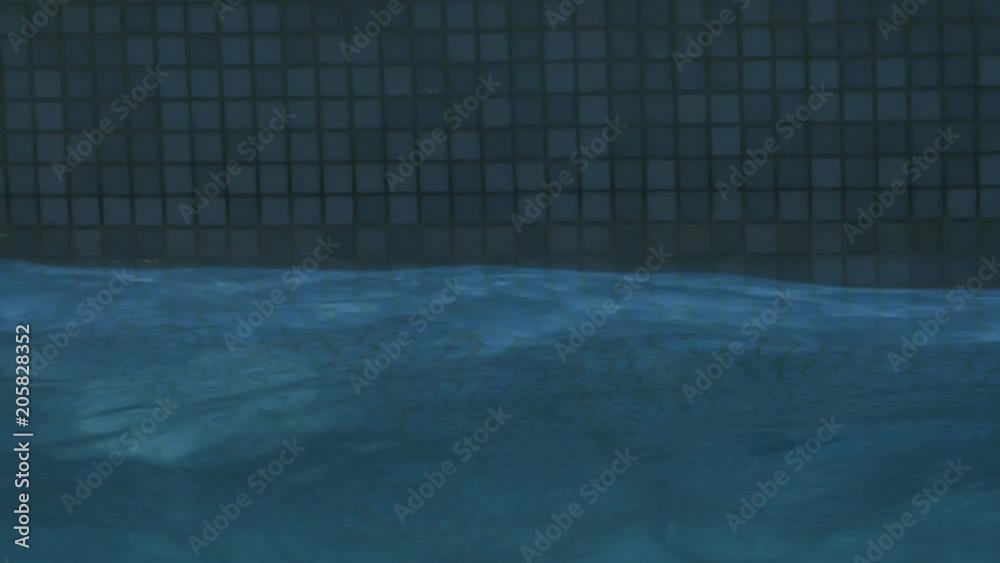 water level in the swimming pool. water level goes above and below the camera. 4K