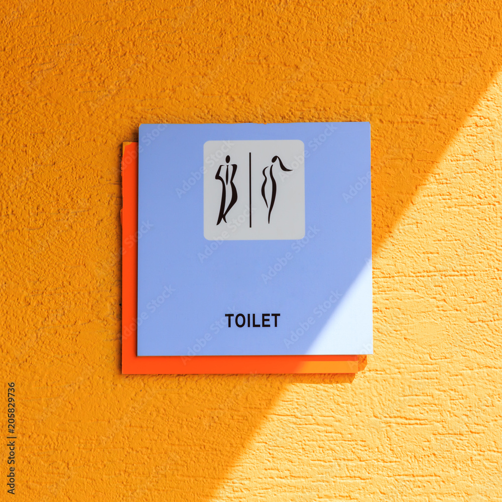Graphic sign of public toilet with light and shadow Stock Photo Adobe
