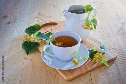 Linden tea on wooden table