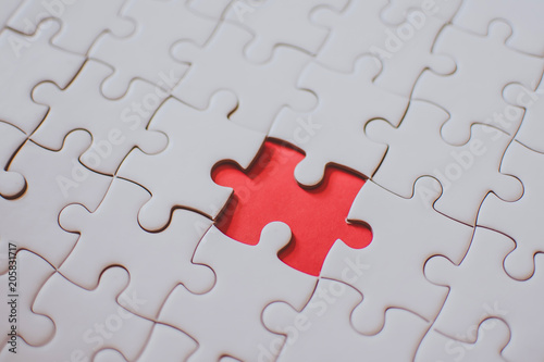Selective focus of pieces puzzle jigsaw  puzzle background.