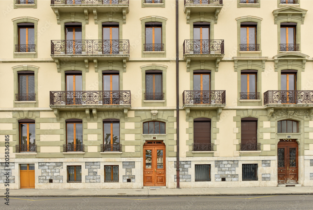 The facade of the old house. The building in Geneva.