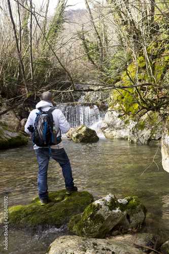 hiker look waterfall in morcone sassinoro country