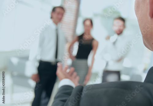 closeup. businessman holding out hand for a handshake.
