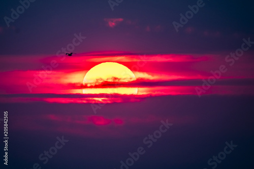 Dramatic sunset over Anglesey in Wales seen from Caernarfon - United Kingdom