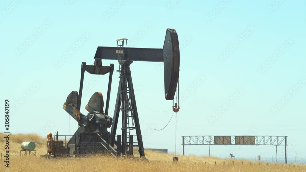 Fossil Fuel, Oil Pump, Pumpjack, Jack pump. Oil field pumping unit - August 2017: Bakersfield, California, US Fossil Fuel, Oil Pump, Pumpjack, Jack pump. Oil field pumping unit - August 2017: Bakersfield, California, US