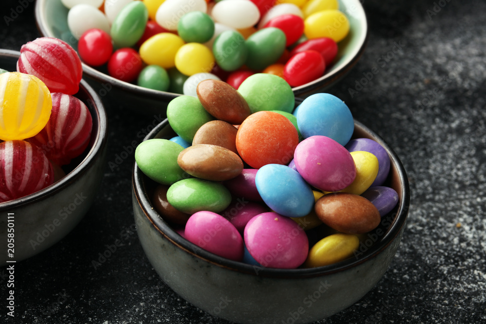 candies with jelly and sugar. colorful array of different childs sweets and treats candies with jelly and sugar. colorful array of different childs sweets and treats
