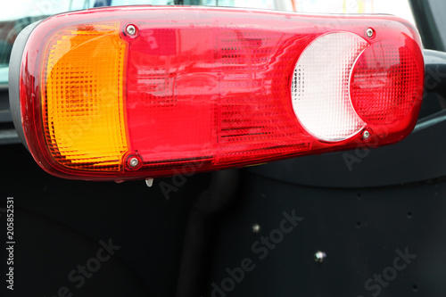 Lighting equipment of a modern tractor. Rear position lamps. photo