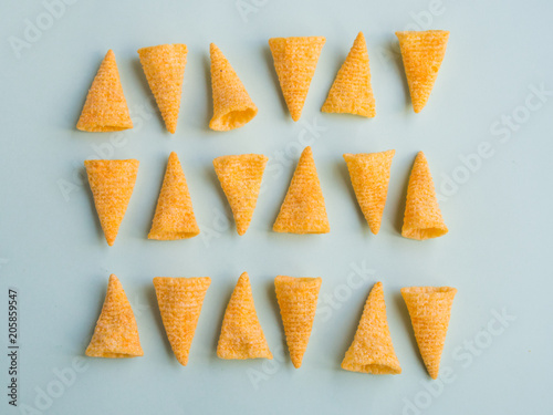 Corn cones pattern on green background