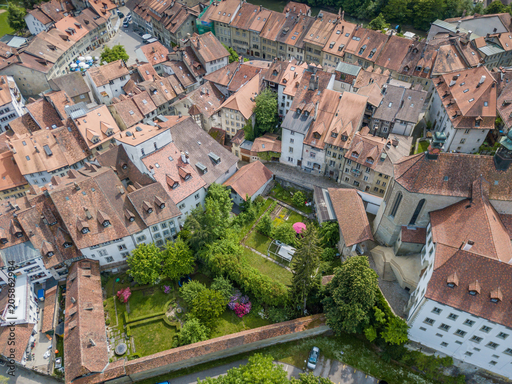Aerial view of old medieval city of Fribourg in Switzerland on a beautiful summer day