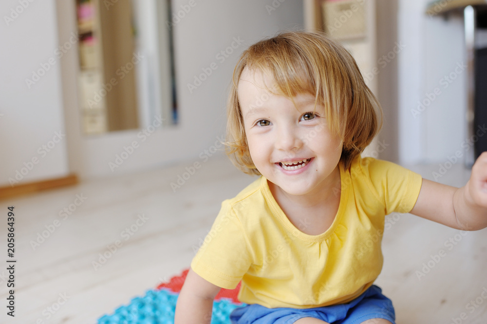 The happy kid smiles. Children's sincere emotion The happy kid smiles. Children's sincere emotion