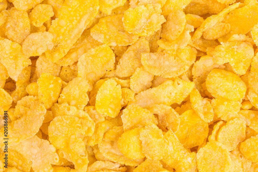 close-up background of crunchy corn flakes for a healthy breakfast close-up background of crunchy corn flakes for a healthy breakfast