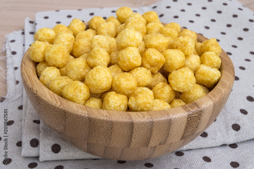 bowl full of corn and honey cereals for breakfast