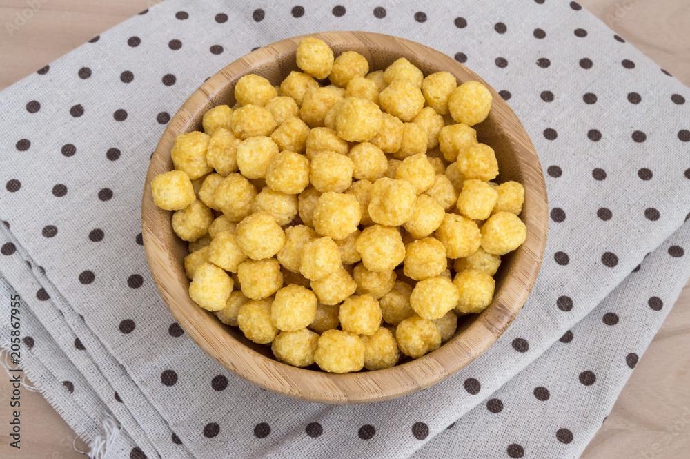 Bowl filled with wheat and honey cereals Bowl filled with wheat and honey cereals