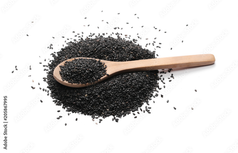 Black organic sesame seeds in wooden spoon isolated on white background Black organic sesame seeds in wooden spoon isolated on white background