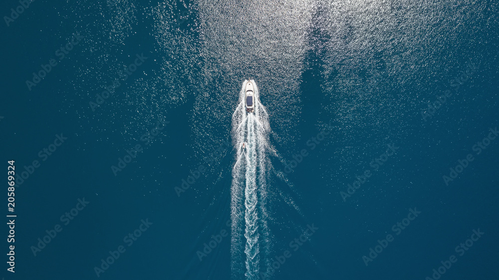Aerial view on the sea and boat. Beautiful natural seascape at the summer time - obrazy, fototapety, plakaty 