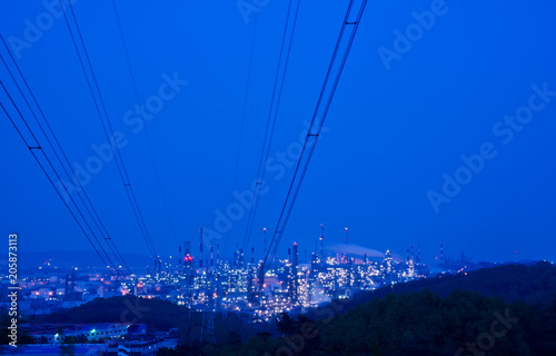 Aerial view Oil refinery.Industrial view at oil refinery plant form industry zone with sunrise and cloudy sky. and Petrochemical background sunset.