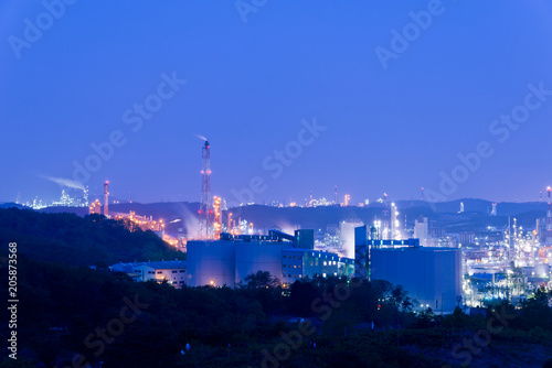 Aerial view Oil refinery.Industrial view at oil refinery plant form industry zone with sunrise and cloudy sky. and Petrochemical background sunset.
