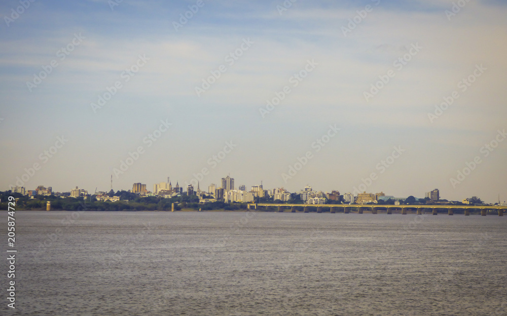 Uruguay river and the cityscape of Uruguaiana, Brazil - viewed from the Costanera (Park by the Uruguay river) in Paso de los Libres, Argentina