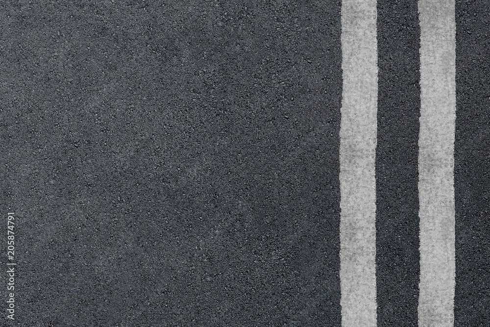 Fototapeta premium Asphalt highway texture with two white stripes