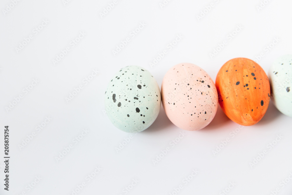 Cute hand painting Easter eggs.Minimalistic style,marbled color.Copy space.White background.