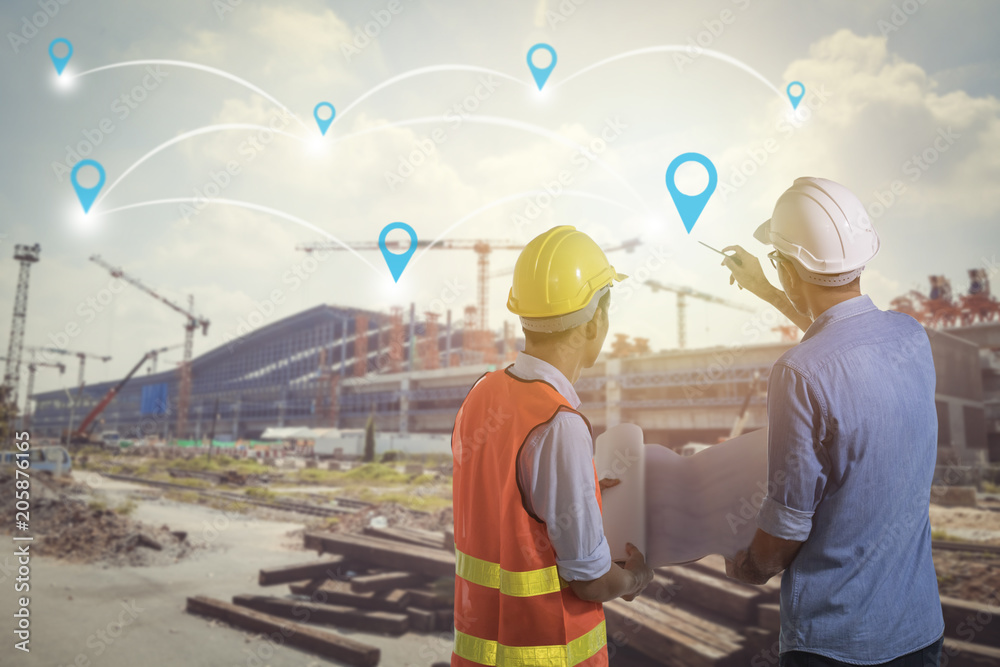 Fototapeta premium engineer on construction site planning and analyzing about construct big building