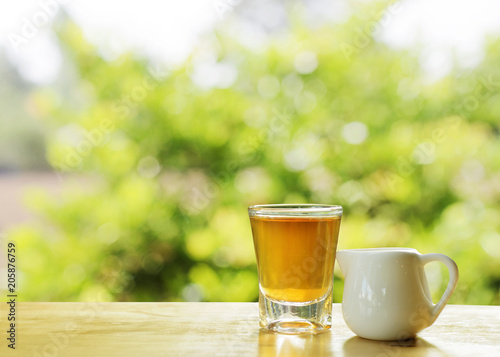 tea drinks with nature tree bokeh sunlights backgrounds