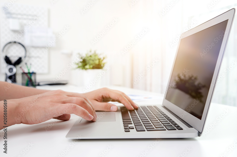 Man working in the office with laptop. Man working in the office with laptop.