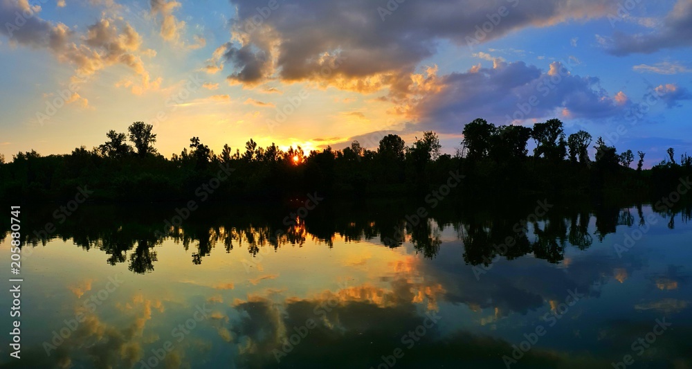 Vibrant ultra wide able panorama with reflection at water