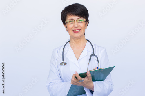 Medical physician doctor woman over white background