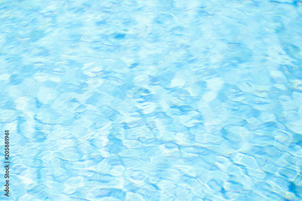 Blue pastel color background of the water surface in swimming pool