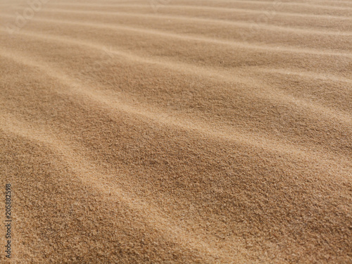 Sand waves pattern background, happy summer holiday concept and selective focus idea