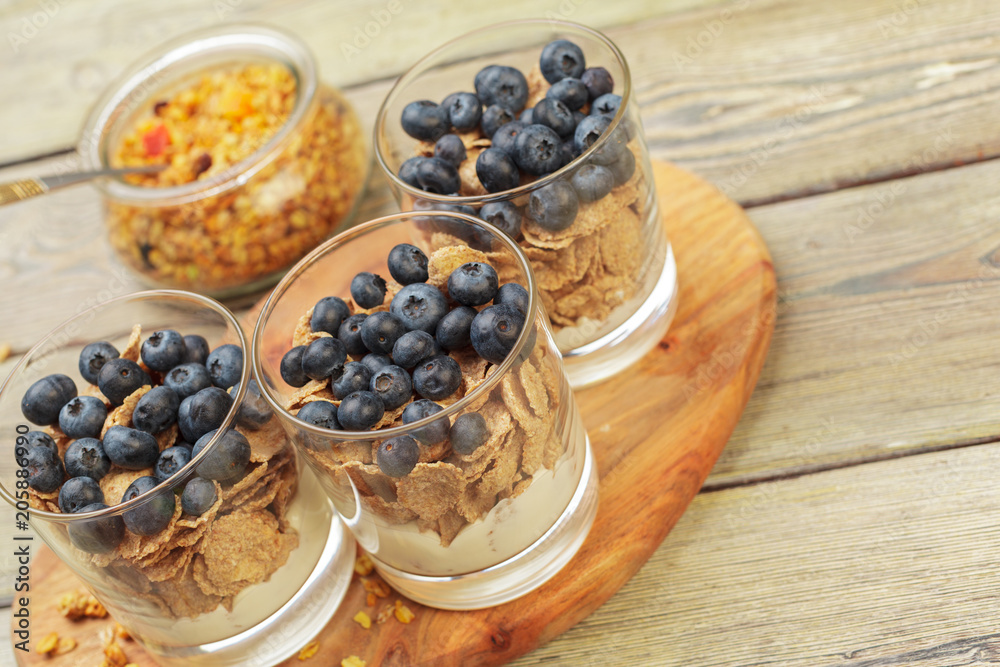 Granola, yogurt and strawberries in a jars Granola, yogurt and strawberries in a jars