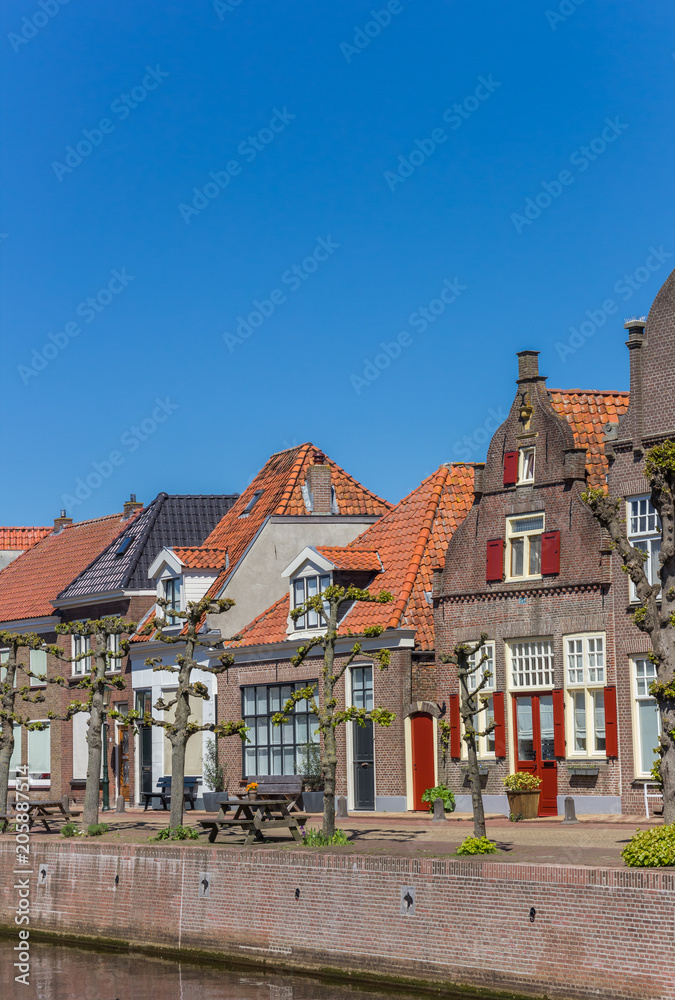 Historic houses at a canal in Hasselt, The Netherlands