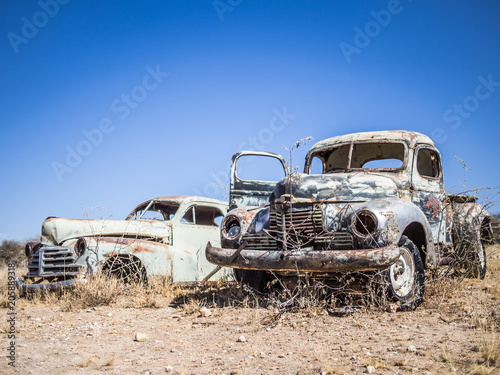 Abandoned classic cars rusting in Namib desert, Namibia