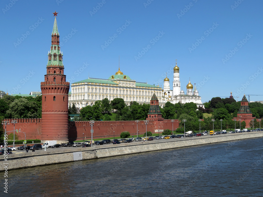 View of the Moscow Kremlin, the Grand Kremlin Palace, Ivan the Great Bell Tower and Cathedral of the Annunciation. Moscow river, russian tourist landmark