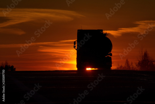 Russia. Fiery sunset on Siberian roads.