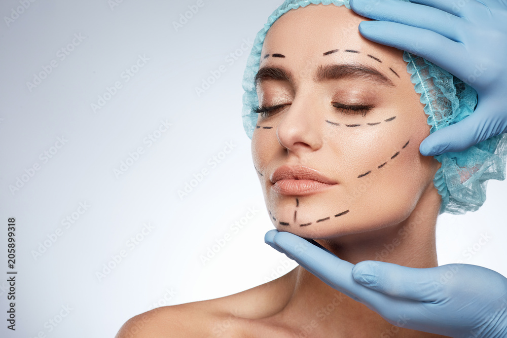 Woman in blue cap with closed eyes