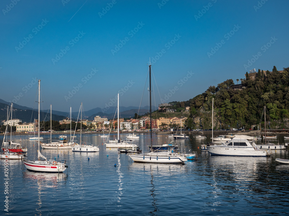 Boats in Baia delle Favole in front of Sestri Levante