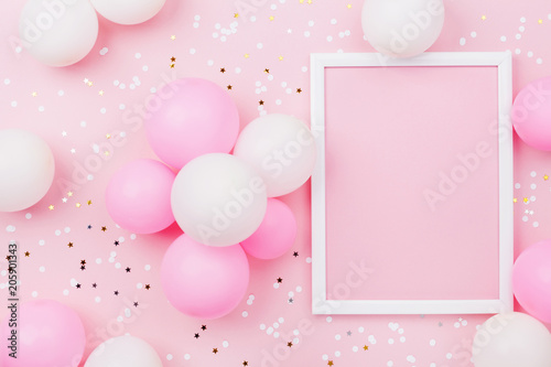 Fotobehang Birthday mockup with frame, pastel balloons and confetti on pink table top view