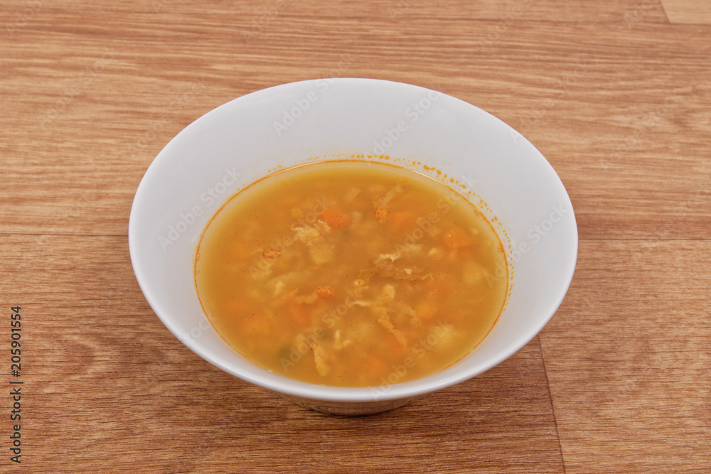 Groat soup with vegetables on a table Groat soup with vegetables on a table