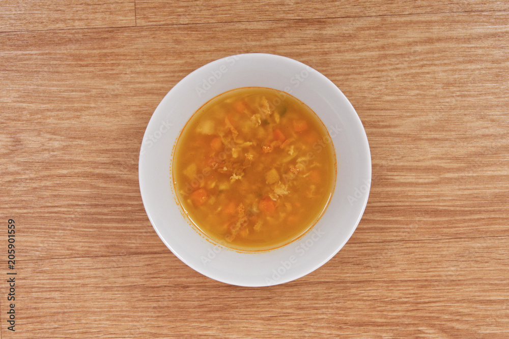 Groat soup with vegetables on a table Groat soup with vegetables on a table