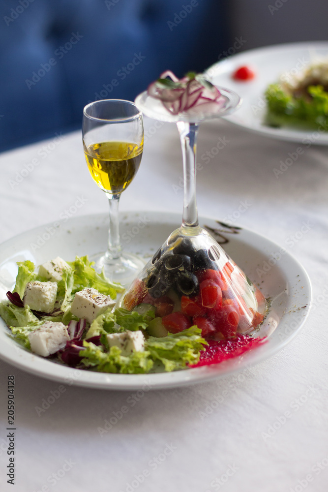 Designed chef salad on white plate. Close up image of business lunch food/ Designed chef salad on white plate. Close up image of business lunch food/