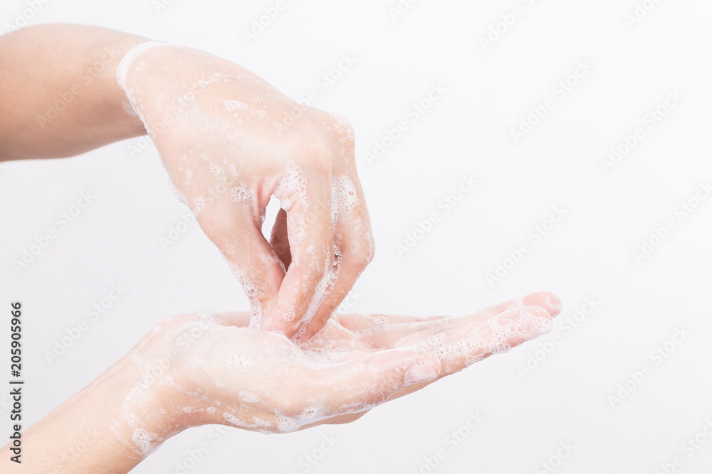 Fototapeta premium Asian woman hand are washing with soap bubbles on white background,Health and Lifestyle Concepts,Global Handwashing Day