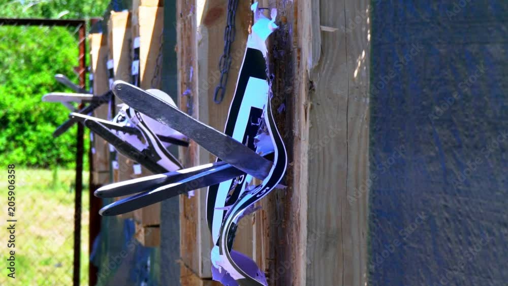 Throwing knives at the target from an openair distance, a competition for throwing knives