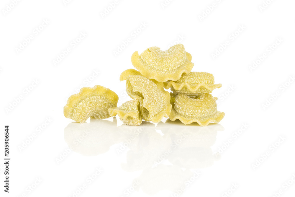 Raw pasta creste di gallo spinach isolated on white background. Raw pasta creste di gallo spinach isolated on white background.