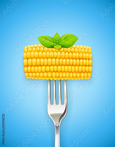 Corn cob at fork. Organic food. Corncob natural meal. Ripe